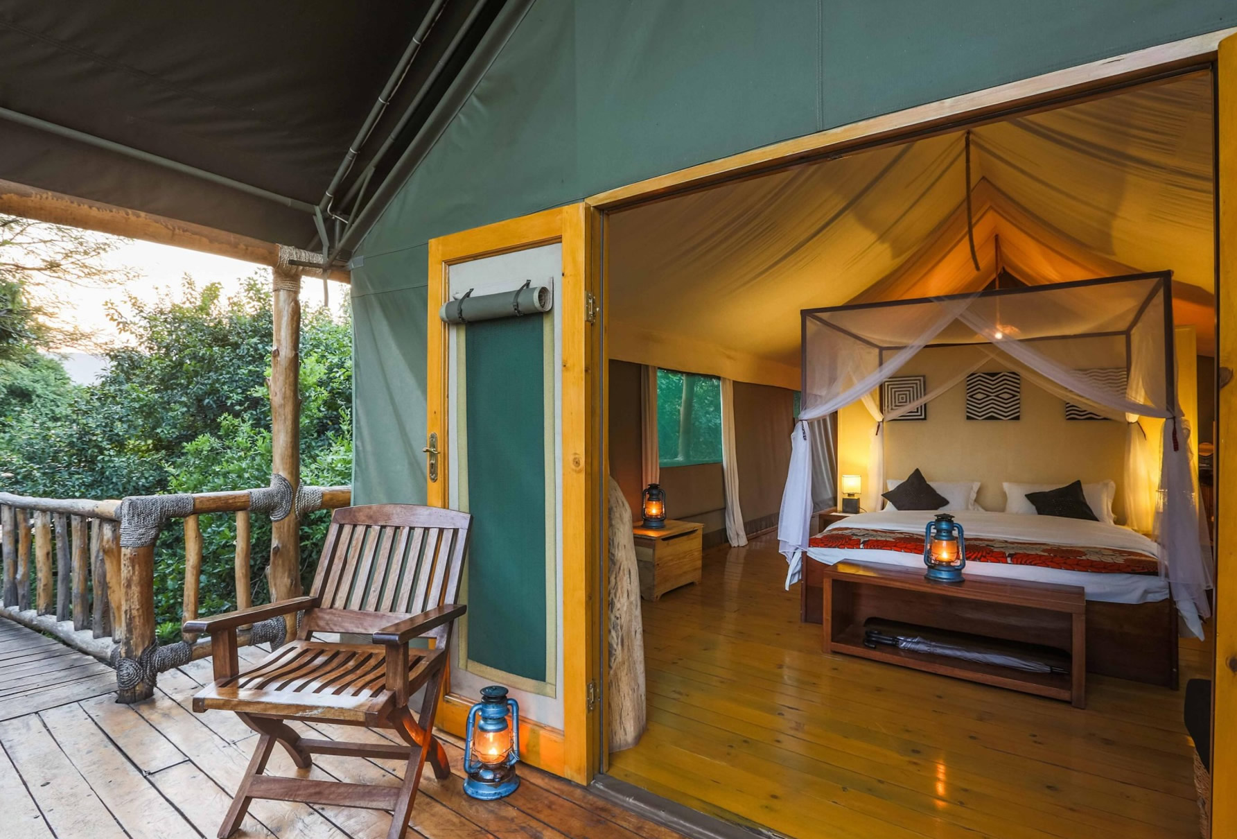 Experience luxury amidst the wilderness at Ruzizi Tented Lodge -Akagera National Park, where spacious tents overlook Lake Ihema. Indulge in gourmet cuisine,