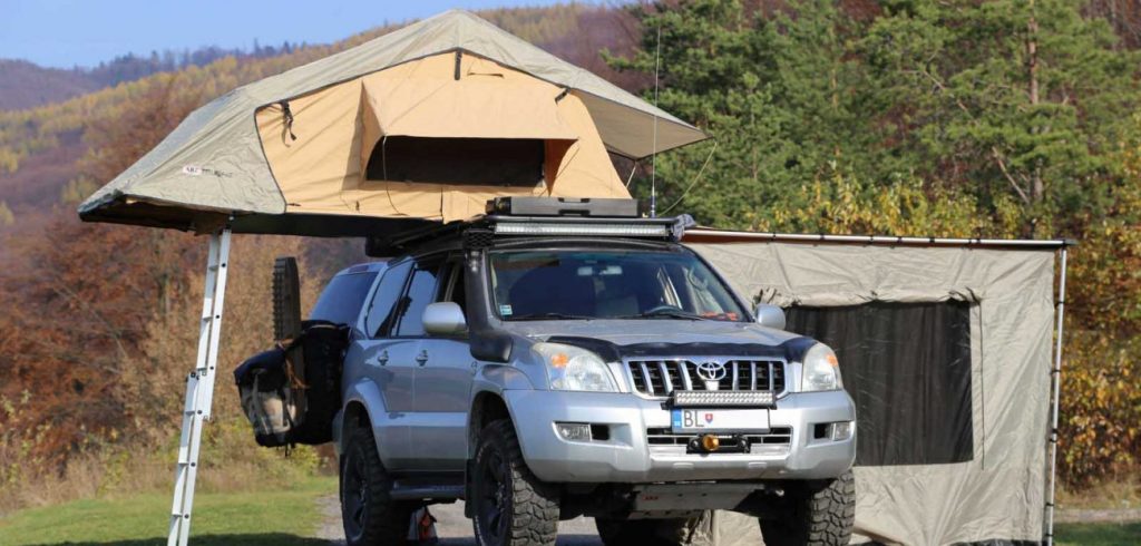 hire a 4x4 Land Cruiser rooftop tent from Car Rentals Rwanda. These robust, fully equipped vehicles are built for rough terrain and provide the added convenience of a rooftop tent,